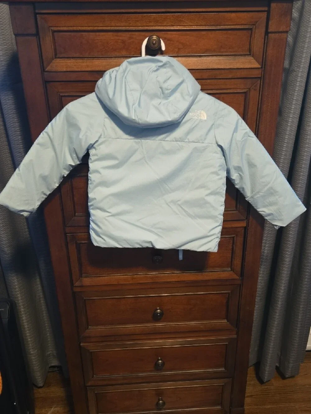 The North Face Light Blue Kids Hooded Puffer Jacket